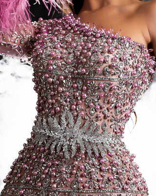 Detailed image highlighting the bodice of a one-shoulder pink dress.