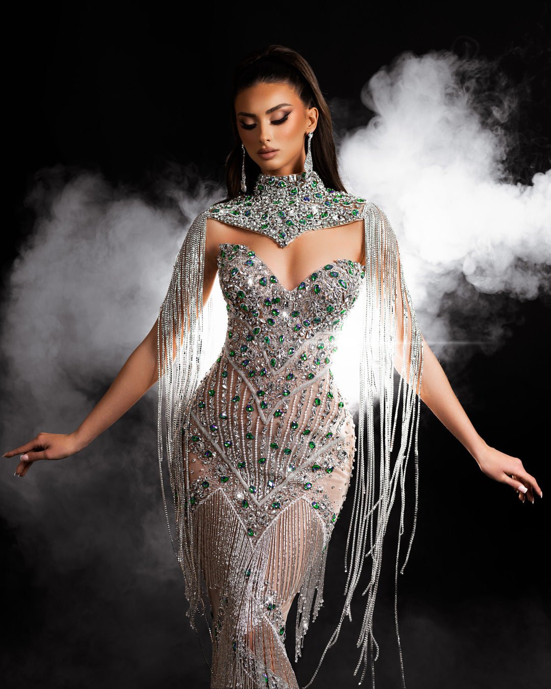 Sleeveless and strapless silver dress adorned with intricate silver stones