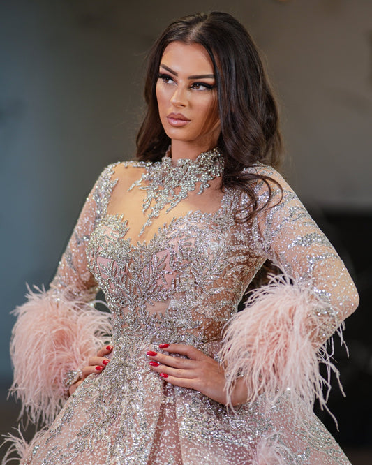 Pink ball gown with feathers