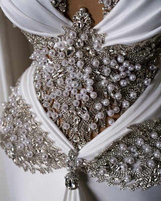 Bridal dress with crystal and pearl-adorned bodice
