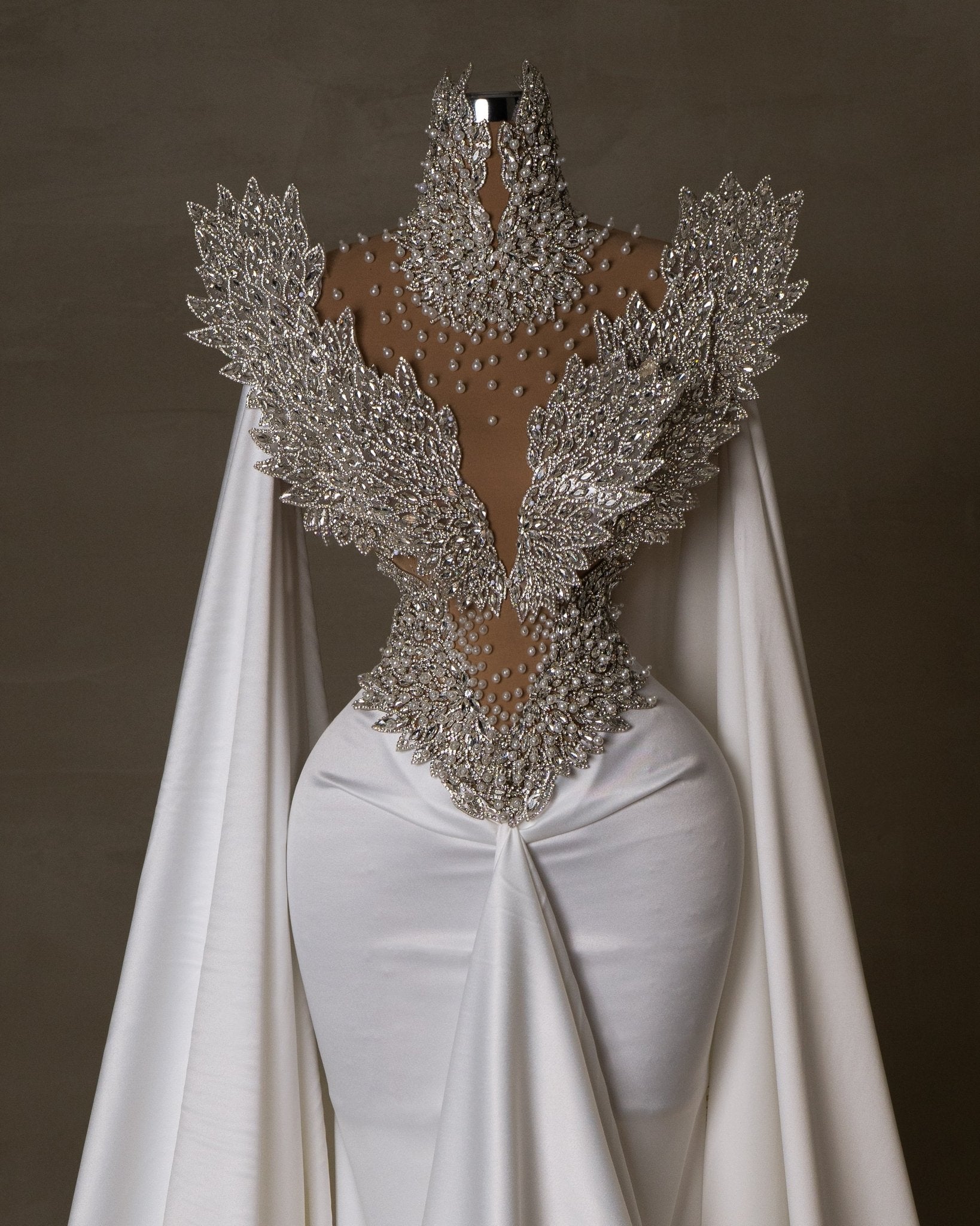 White bridal dress with silver crystal bodice.