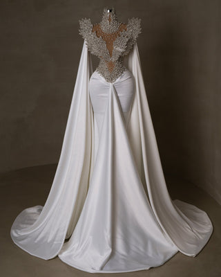 White satin bridal dress with crystal embellishments.