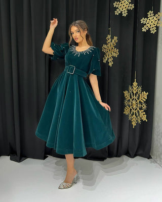 Tea-Length Velvet Green Dress with Puff Sleeves, Belt, and Beaded Accents