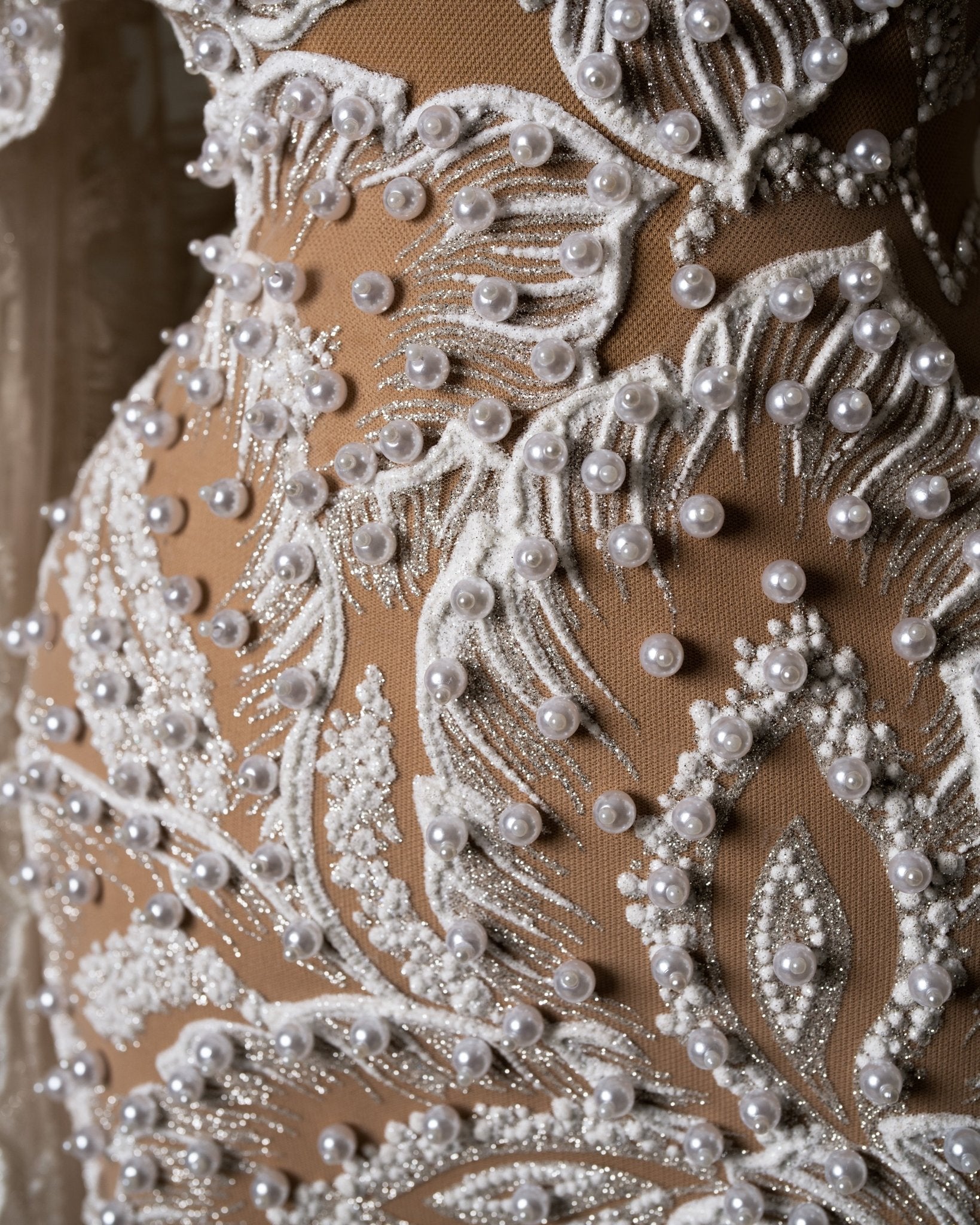 Close-up of Intricate Pearl Embroidery on Bridal Dress