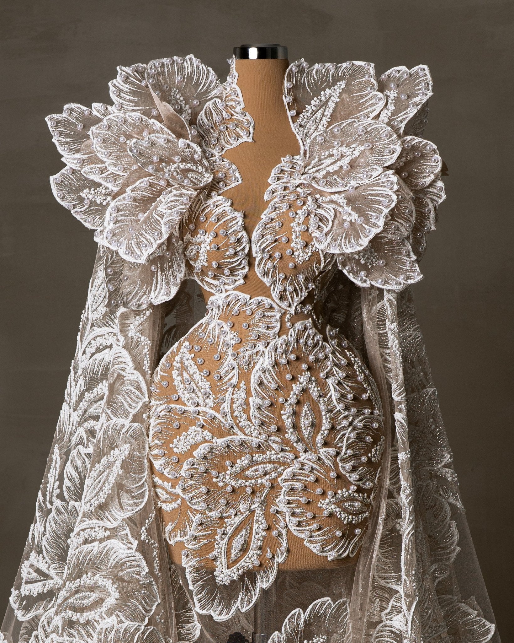 Exquisite Lace Bridal Dress with Pearl Embellishments