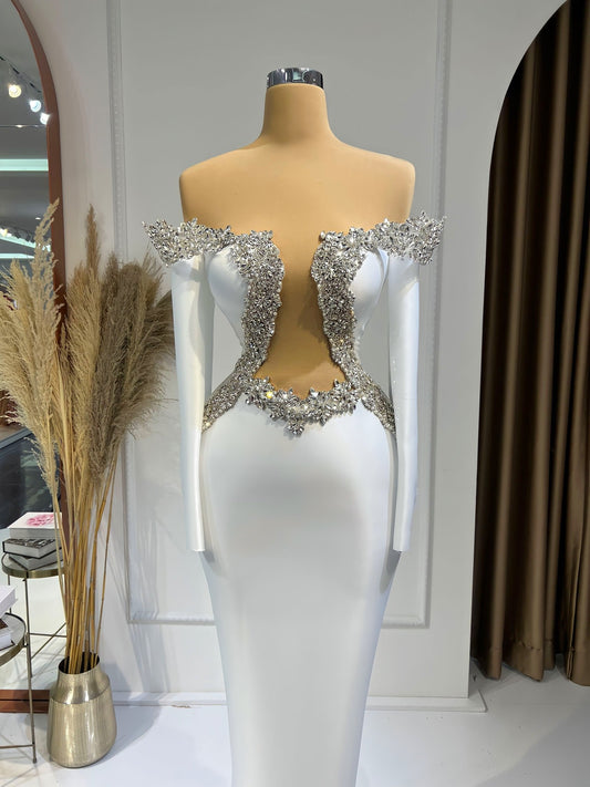 Fleuri Long Sleeve Bridal Gown with a Deep Chest-to-Waist Cut