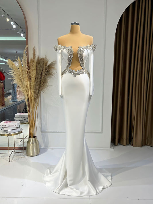 Fleuri Long Sleeve Bridal Gown with a Deep Chest-to-Waist Cut