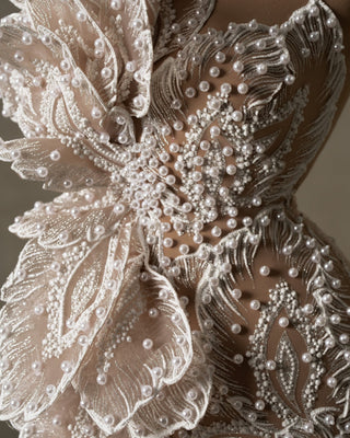 Detailed View of Pearls Adorning Bodice of Sleeveless Bridal Dress - Modern Glamour