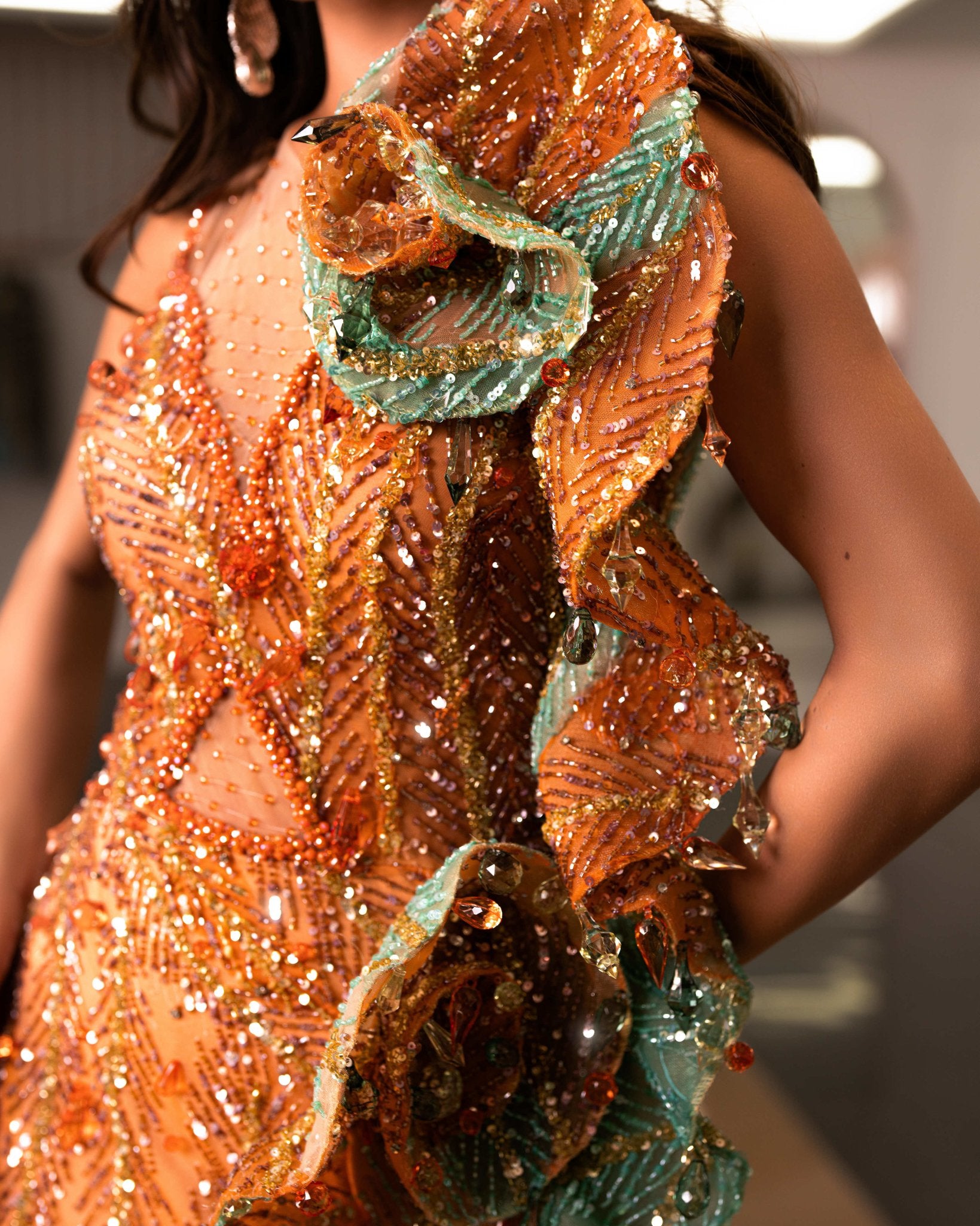 Elegant Cut-Out Dress Adorned with Crystals and Feathers