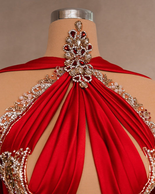 Detailed View of Red Dress with Cape