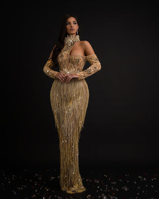 Elegant long dress with gold tassels