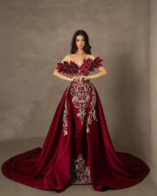 Long off-shoulder dress in rich dark red satin.