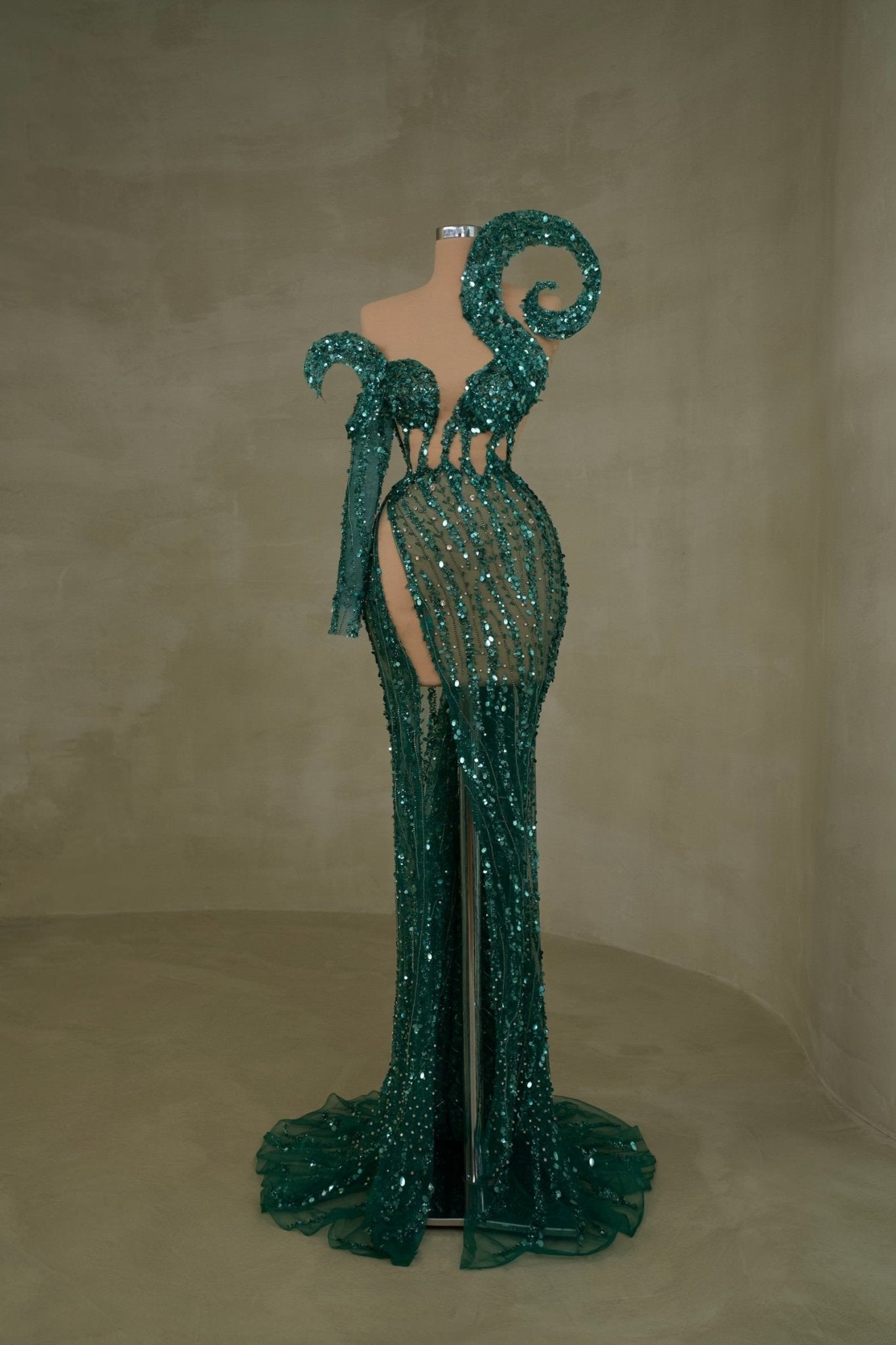 Green one-shoulder dress with shimmering elegance