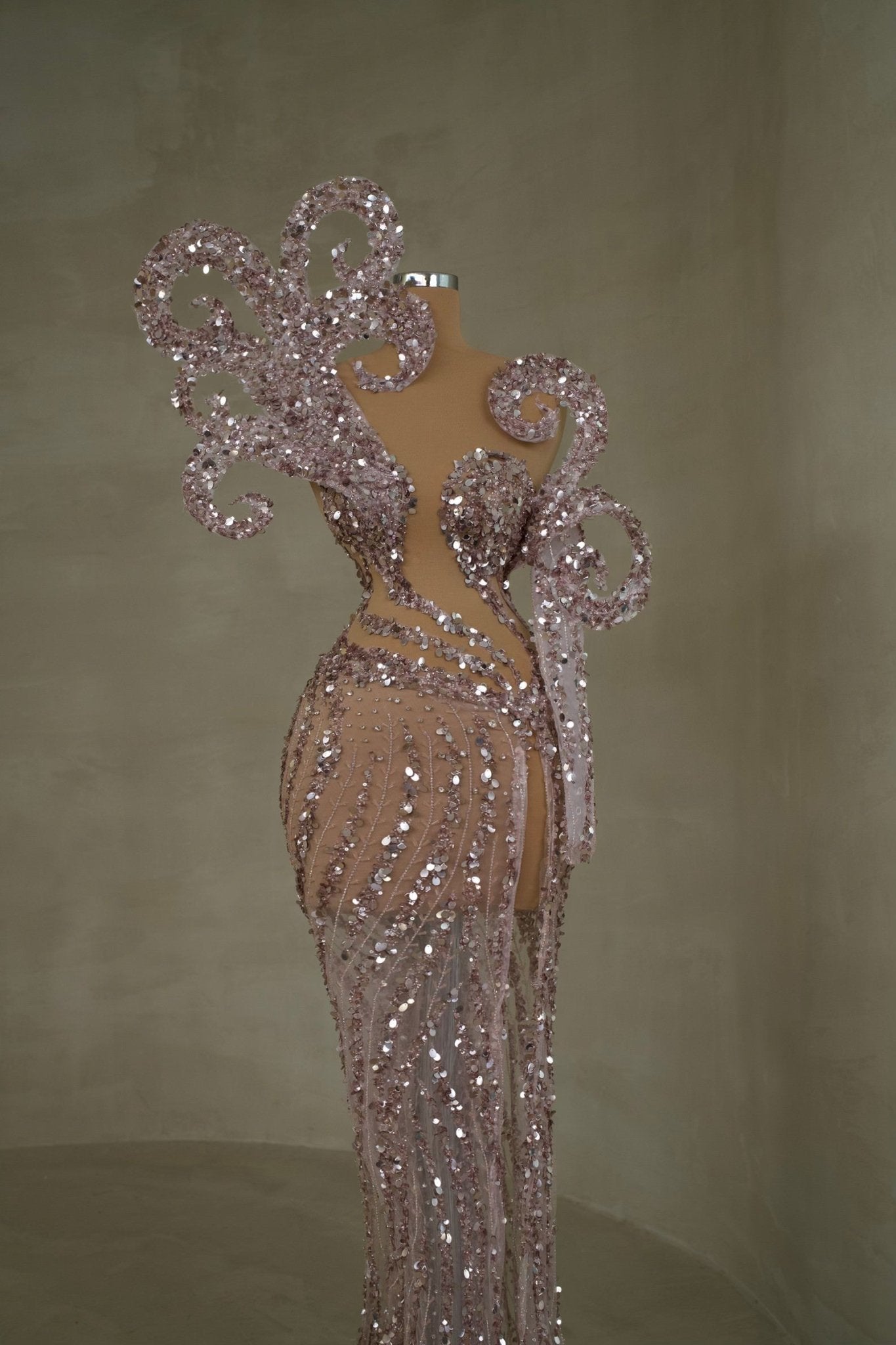 Captivating shimmering dress in a lovely light pink hue