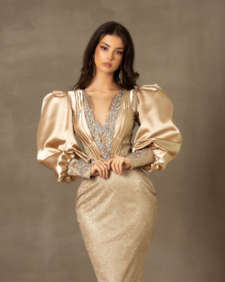 Luxurious gold satin dress with sparkling lace details, featuring long puff sleeves