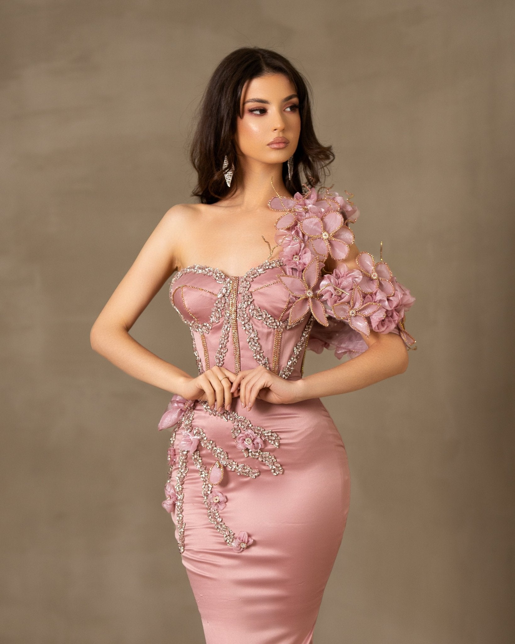  Pink satin dress with one-shoulder design.