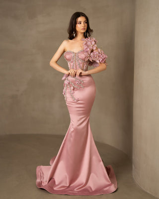 Pink satin one-shoulder dress adorned with floral sleeves and delicate stones.