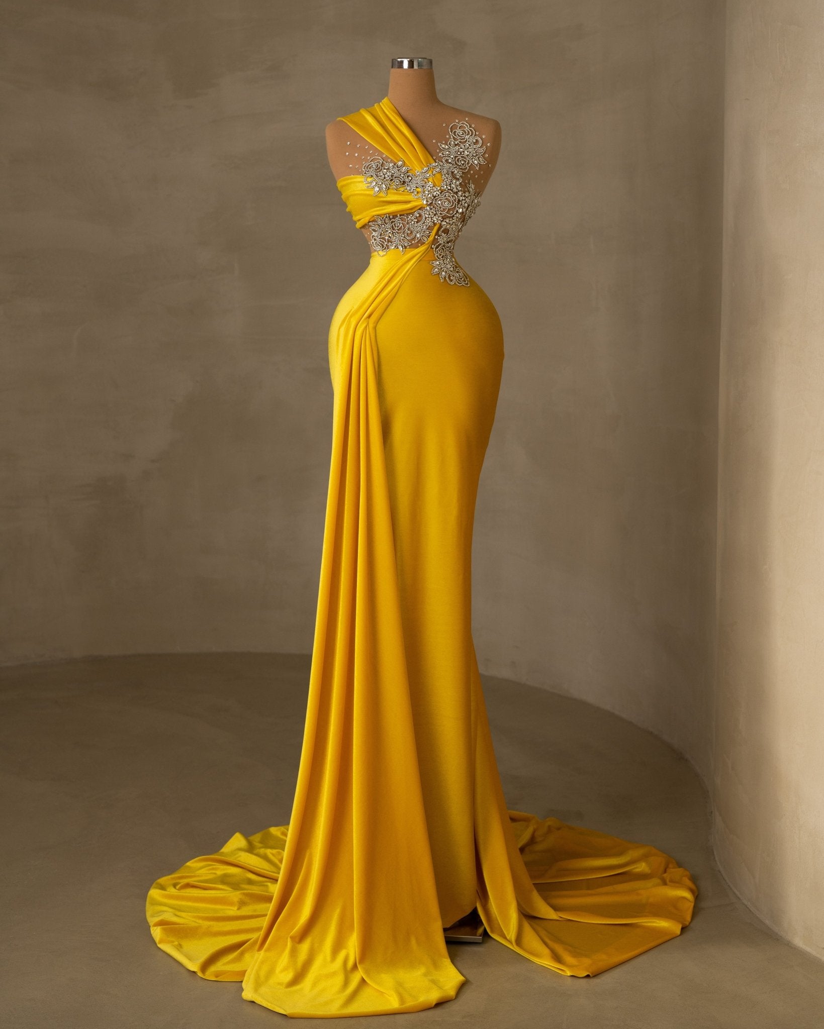 Elegant and luxurious velvet dress in a stunning yellow hue.