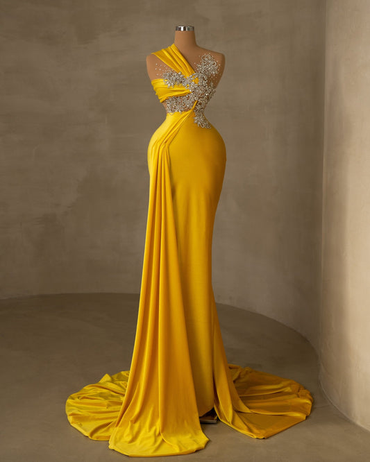 Elegant and luxurious velvet dress in a stunning yellow hue.