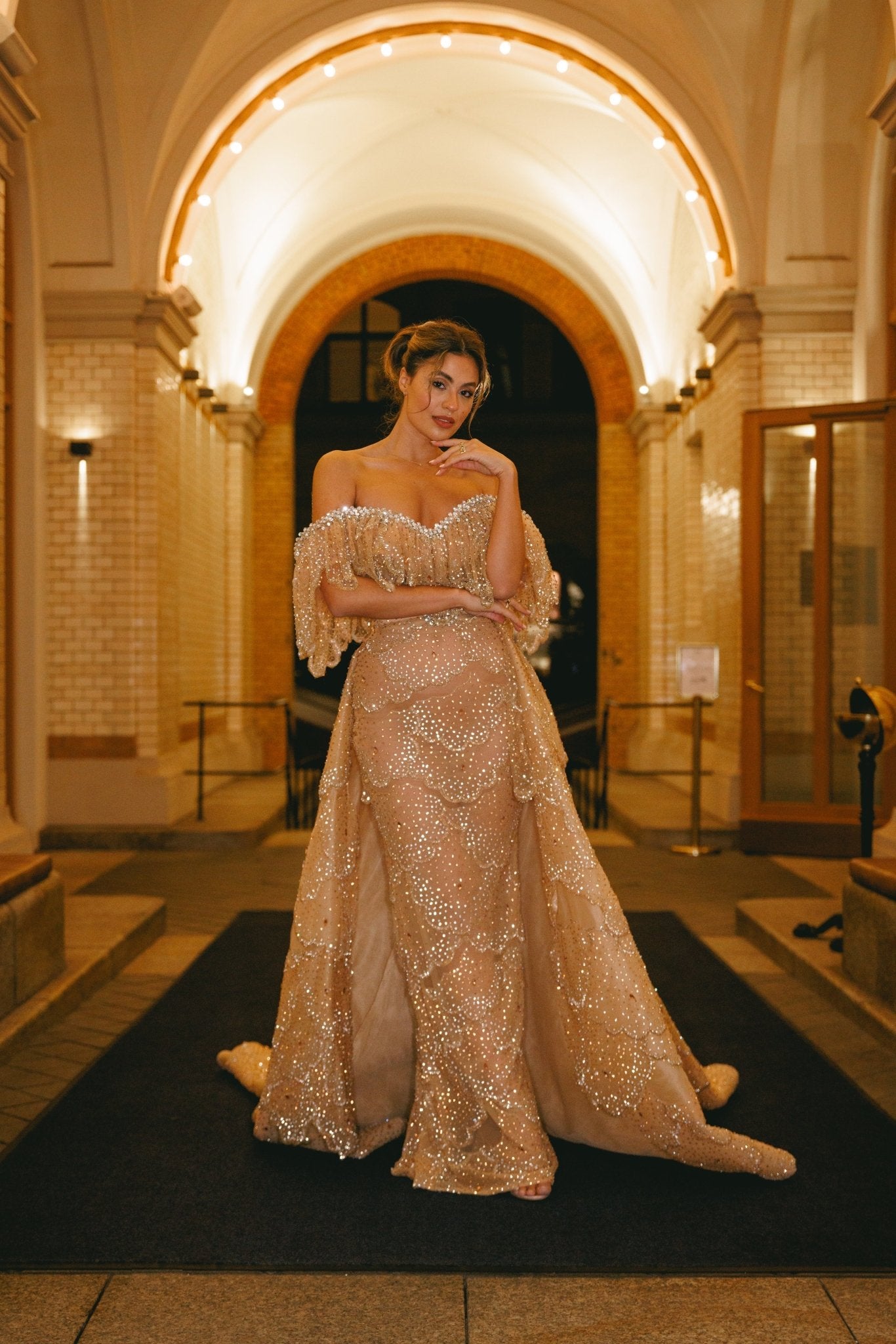 Jessica De Oliveira wearing a stunning dress at a glamorous event
