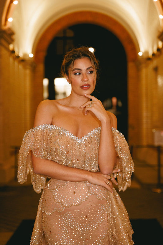 Beautiful Jessica De Oliveira showcasing a fashionable dress for a special occasion