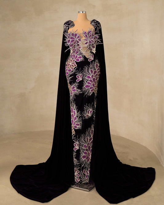Elegant Velvet Gown Adorned with Flowers and Complemented by a Cape