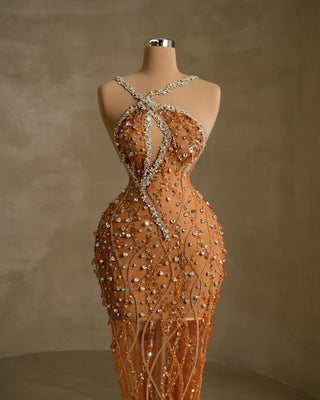 Elegant Dress with Off-Center Neckline, Embellished with Stones and Delicate Feathers