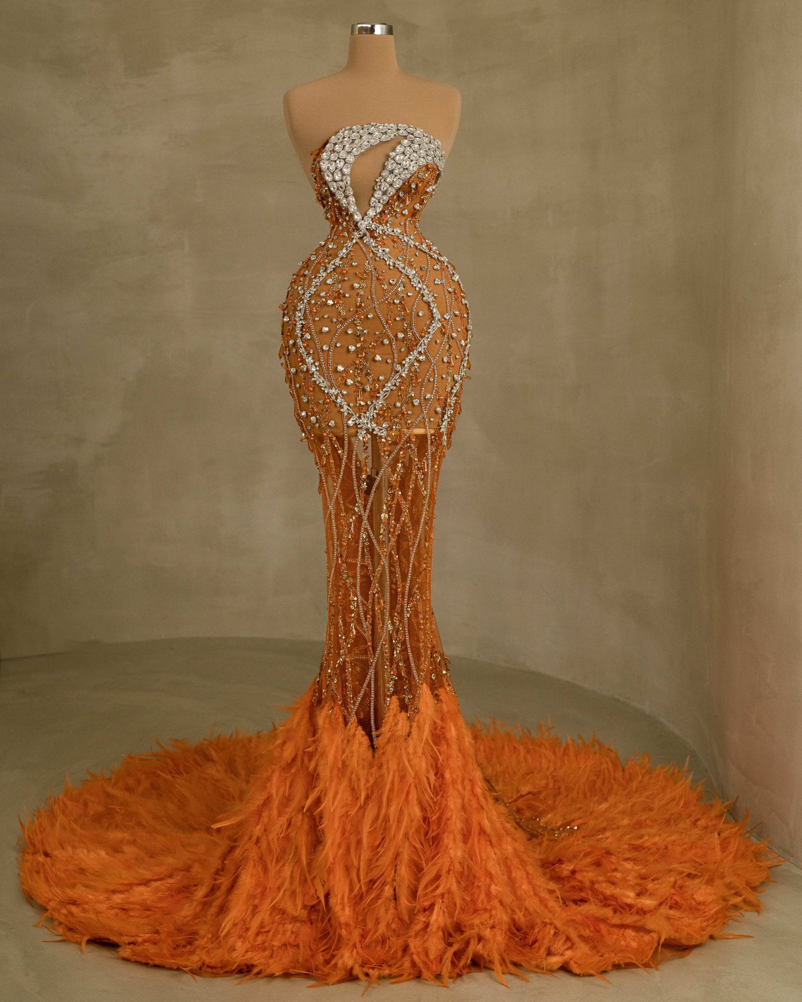 Sleeveless Dress with Crystal Embellishments and Feather Accents