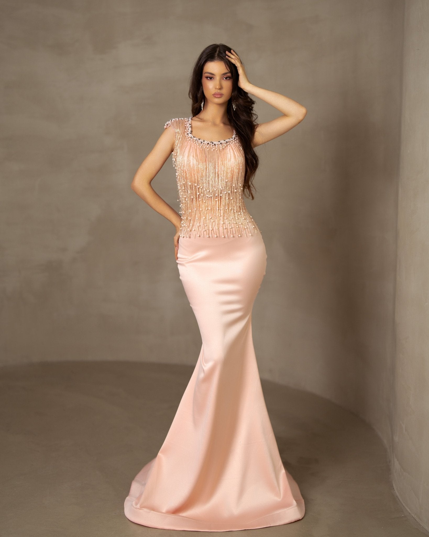 Satin dress embellished with tassels