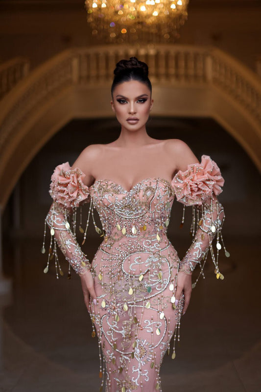 Elegant off-shoulder evening gown in a flowing silhouette.