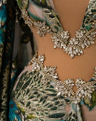 Close-up of V-Neckline Dress with Side Cape - Exquisite Details
