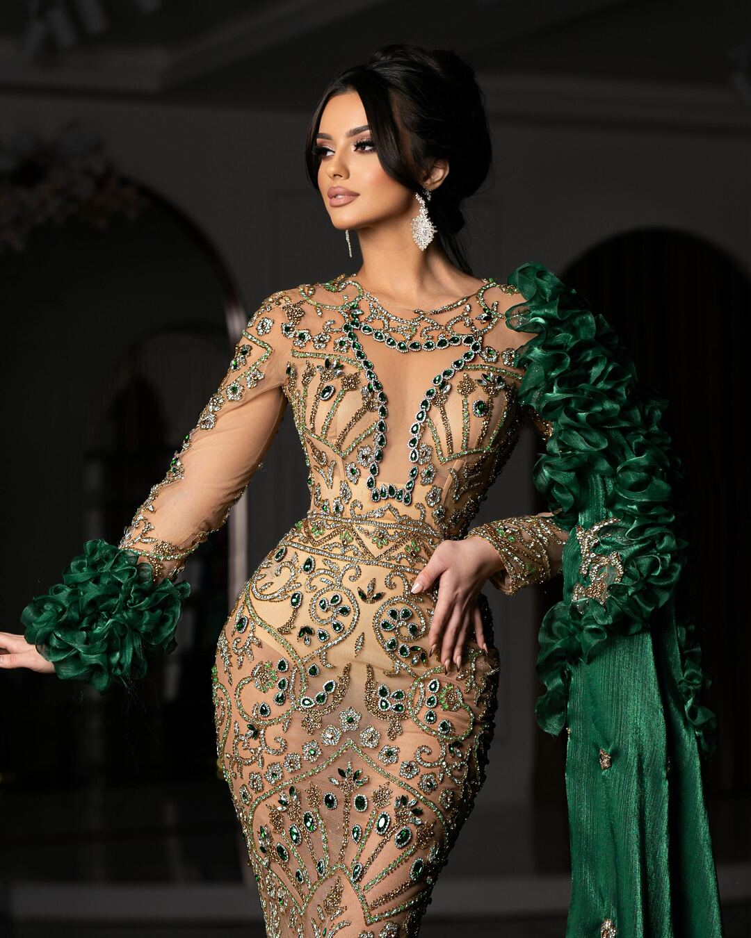 Elegant long green dress with side cape