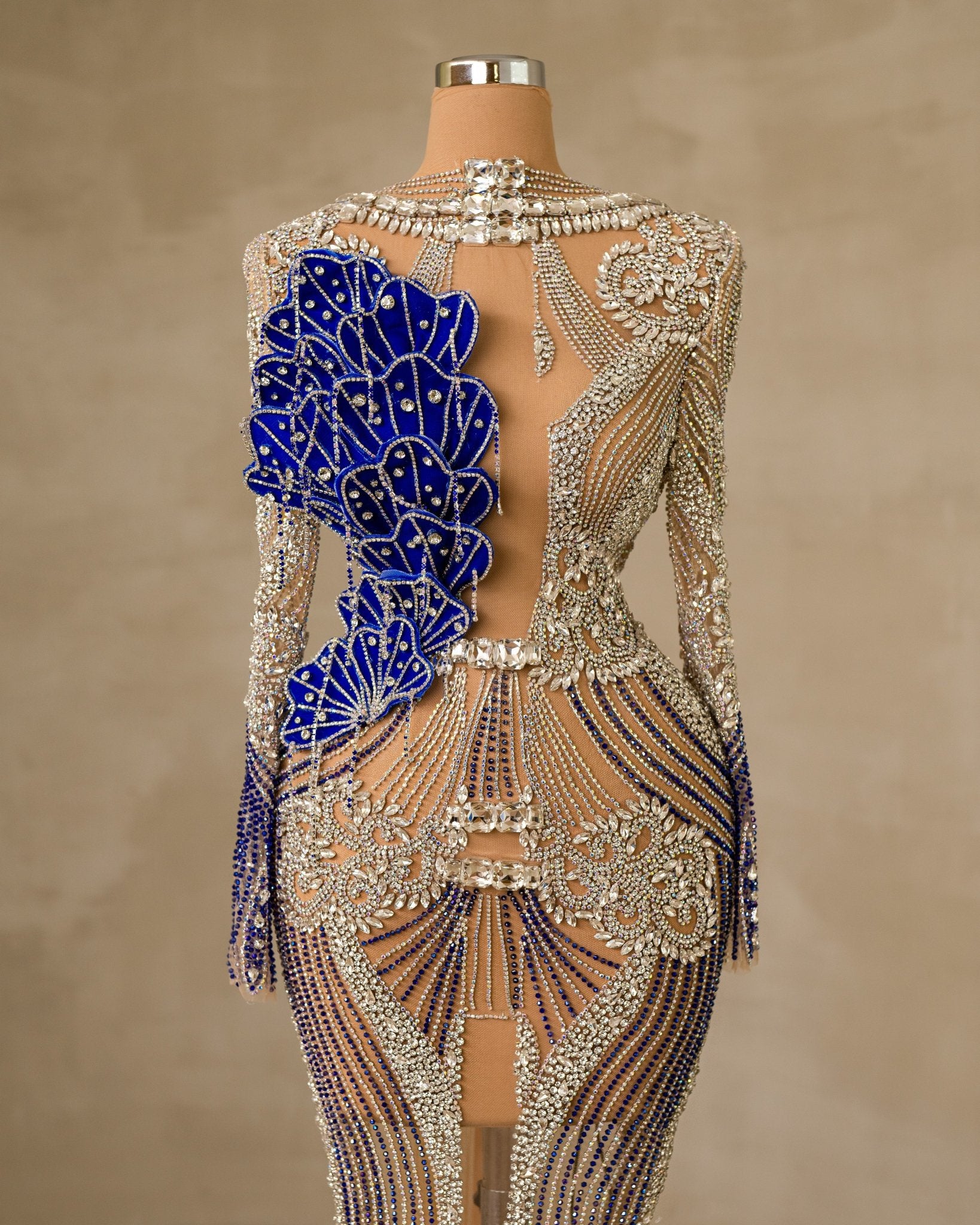 Glamorous Stone-Embellished Dress with a Striking Chest Cut-Out