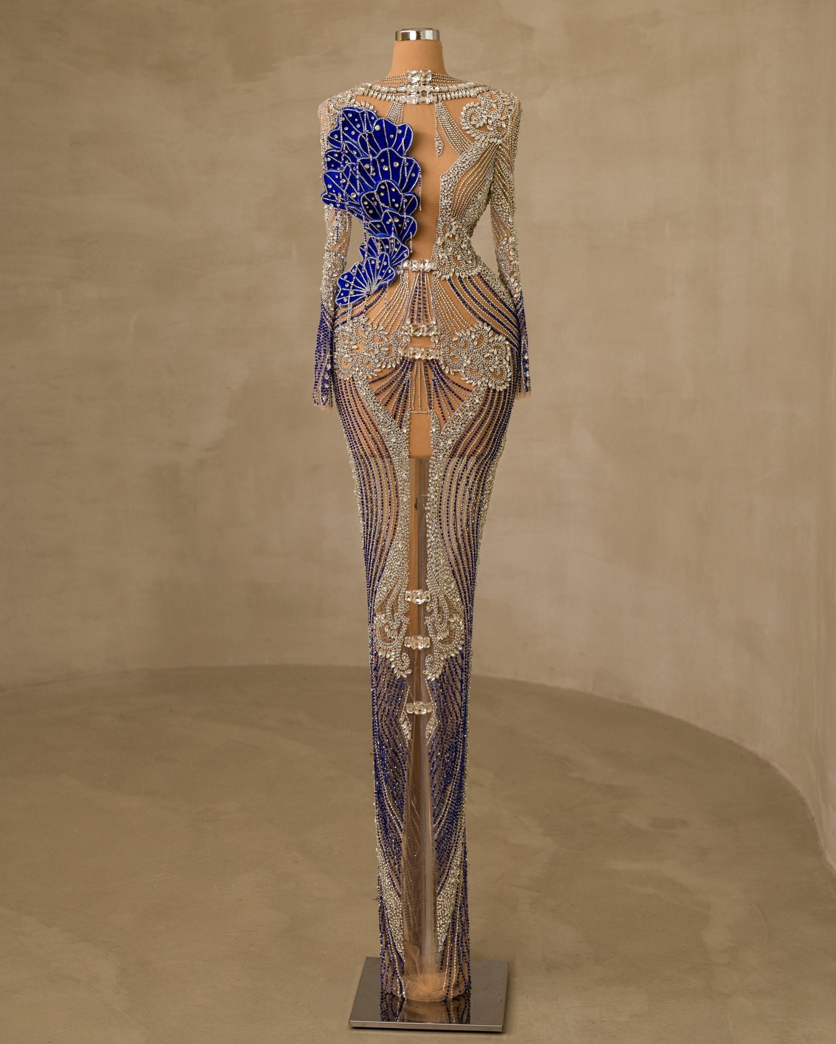 Stunning Dress Adorned with Stones and Featuring a Bold Chest Cut-Out