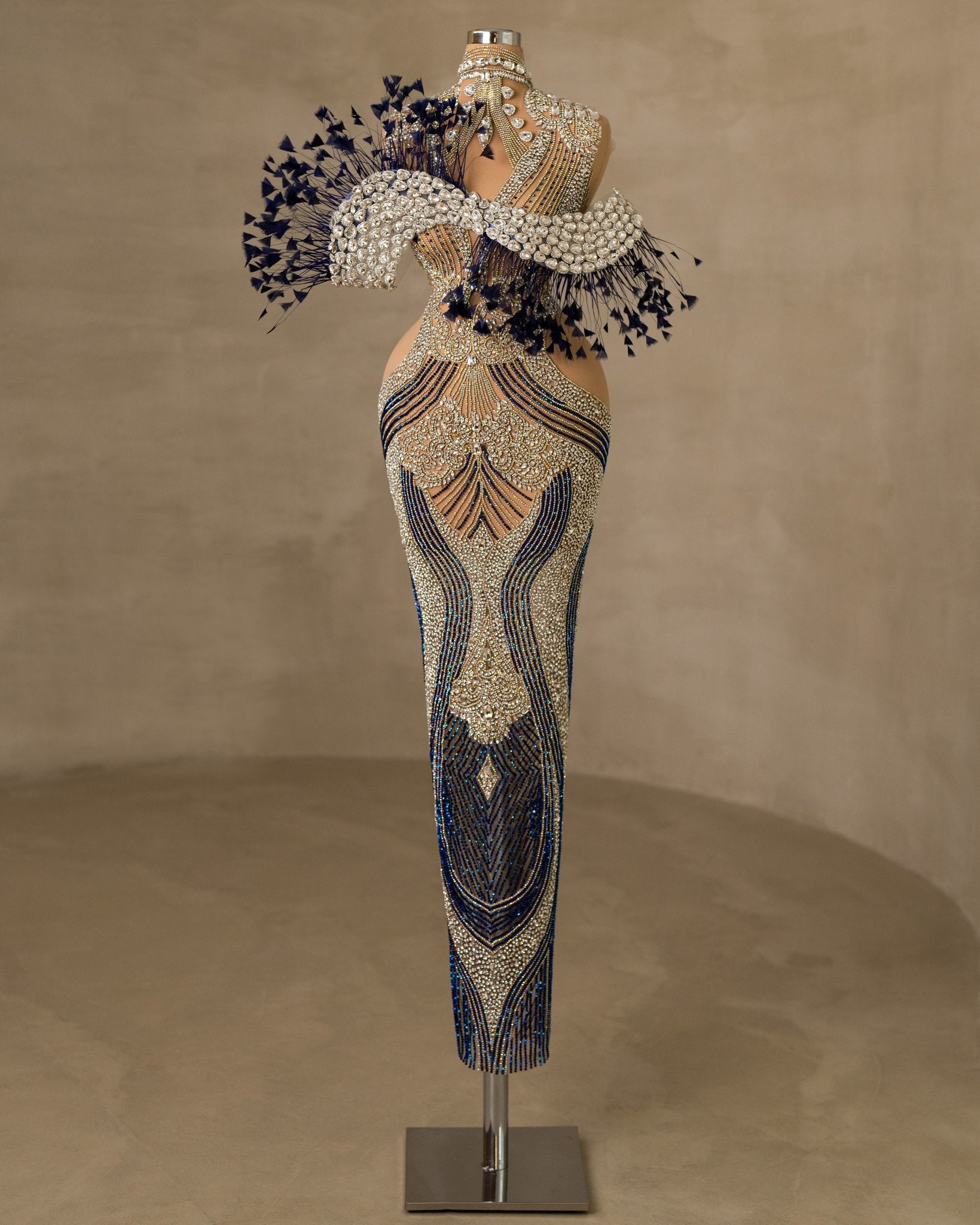 Stunning Stone and Feather Embellished Sleeveless Dress for a Glamorous Look