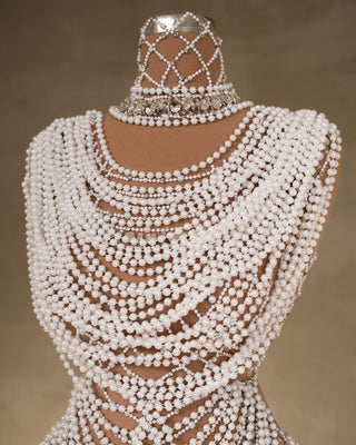 Close-up of shimmering pearls on a bridal dress