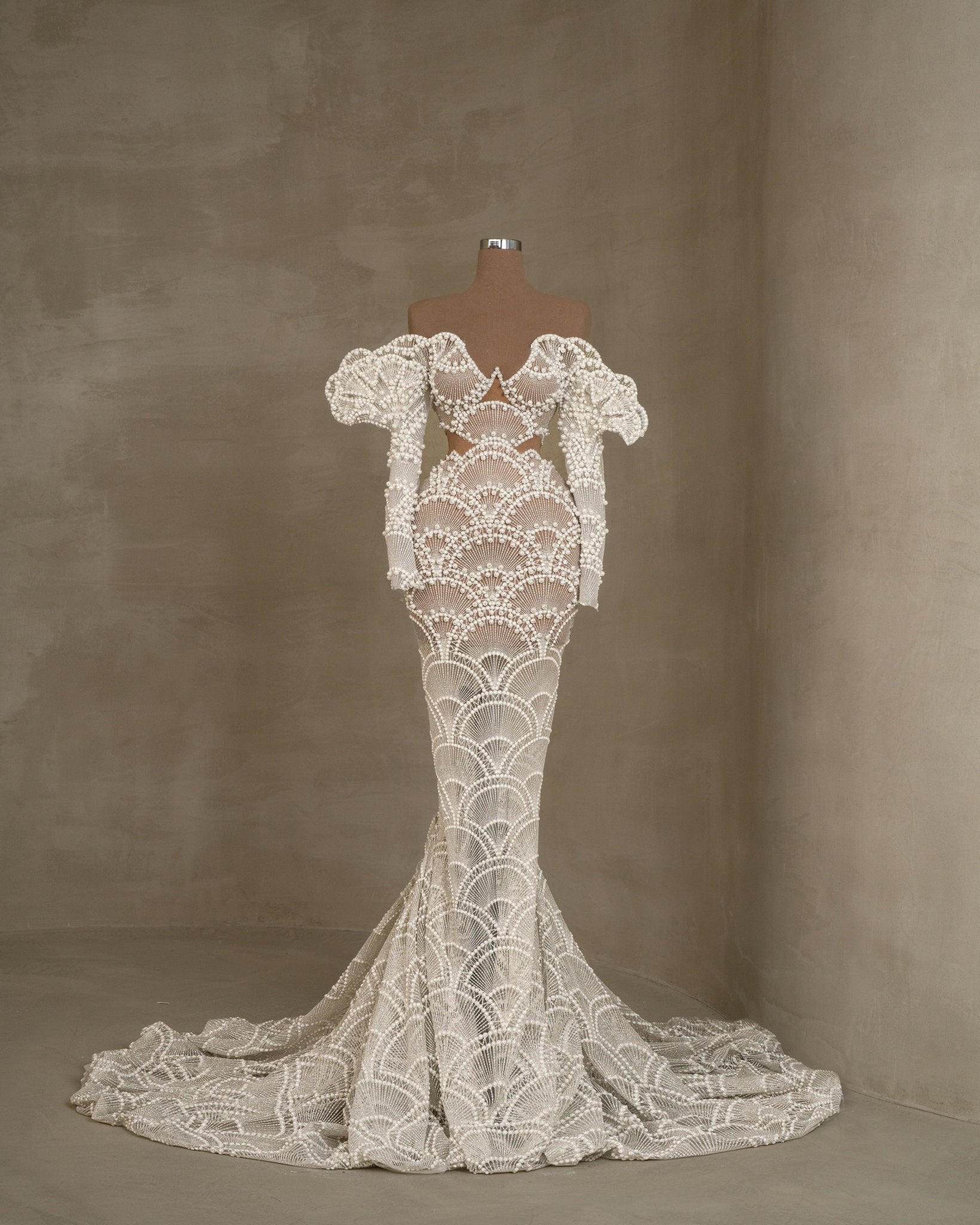 Long sleeve bridal dress with off-shoulder design