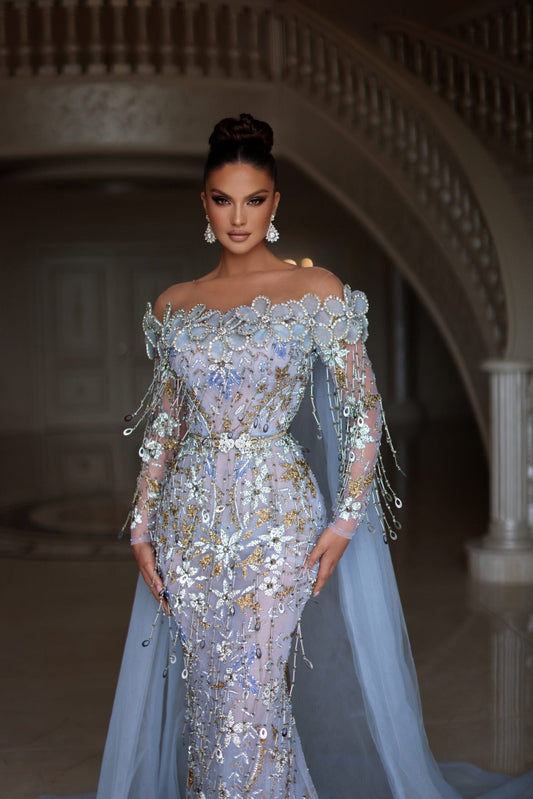 Baby blue dress with stones, flowers and tassels