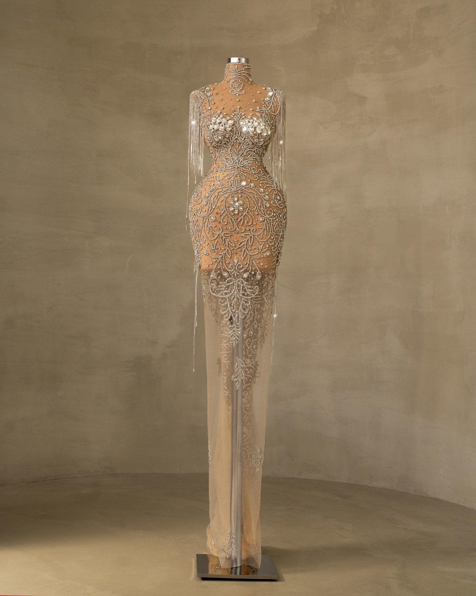 Elegant Rhinestone and Tassel Detailing on Silver Evening Gown