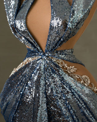 Close-up of the bodice on a light blue sequin dress