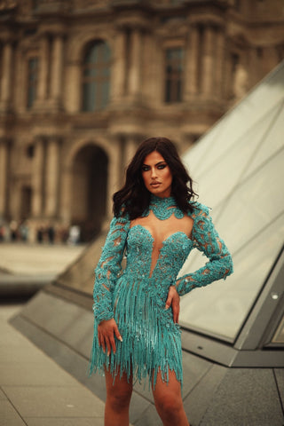 Miranda Karpuzi radiating elegance in Blini's captivating blue dress