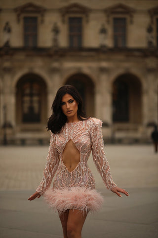 Miranda Karpuzi radiating elegance in Blini's pink dress