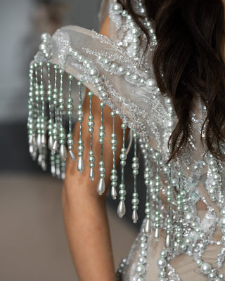Close-up of Exquisite Bead Embellishments on a Lace Evening Dress