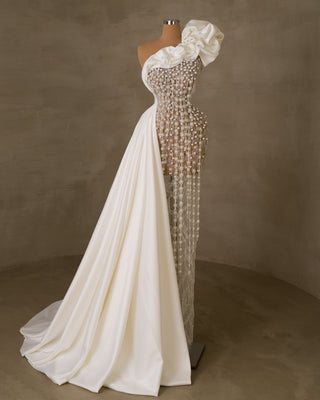 Bridal dress adorned with pearls and lace