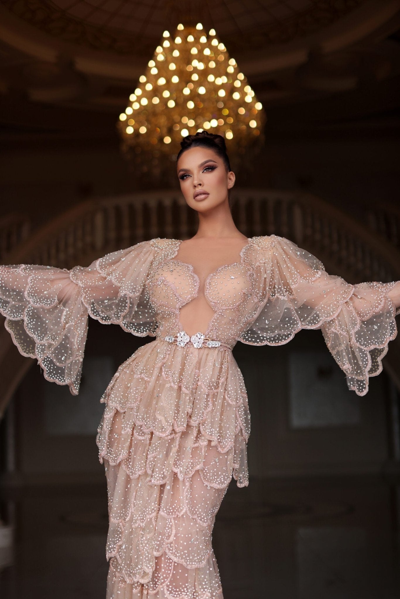 Elegant beige dress showcasing sophisticated design.