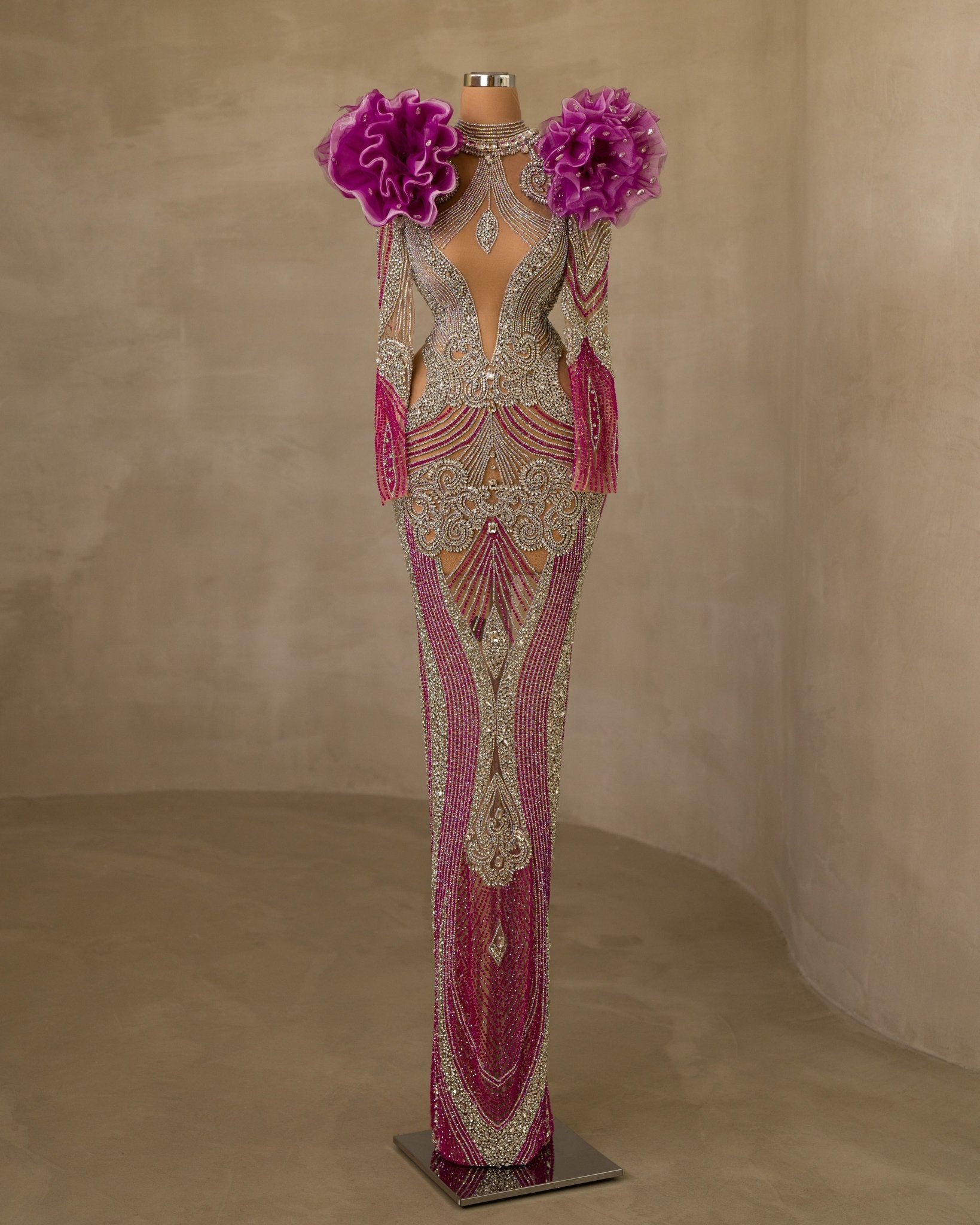 Stunning Dress featuring Stone Embellishments and a Striking Chest Cut-Out