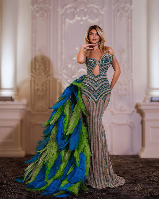  Fancy lace, green-blue-silver crystals, and a cutout waist. 