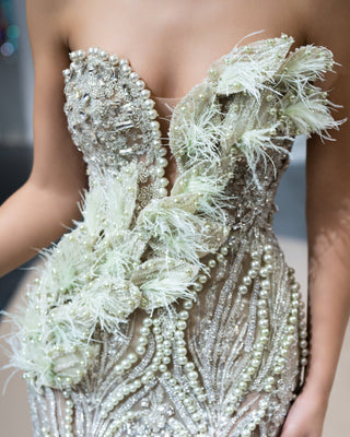 Close-up of Light Green Beaded Details on a Sleeveless Lace Gown