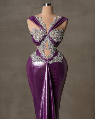 Elegant long purple dress with shimmering fabric and silver crystal embellishments