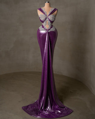 Regal purple gown adorned with sparkling silver crystals, perfect for special occasions